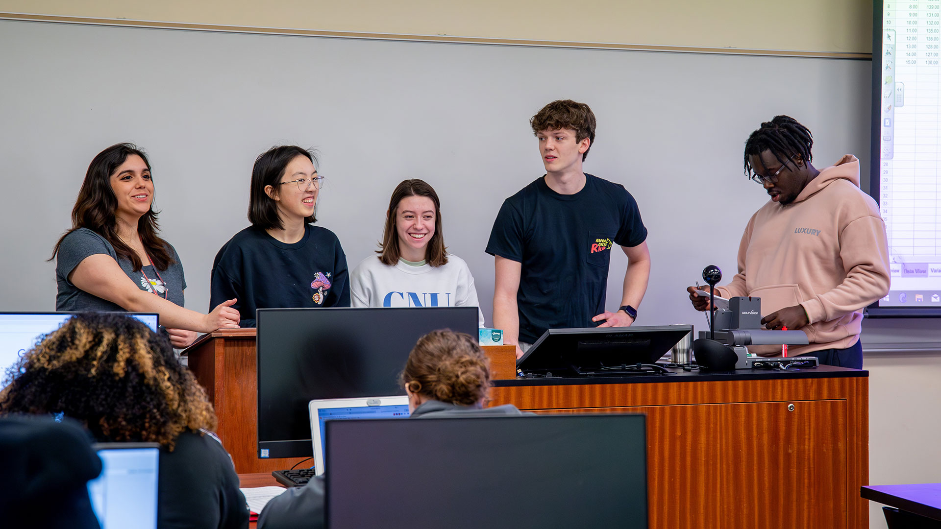 Students give a presentation in class