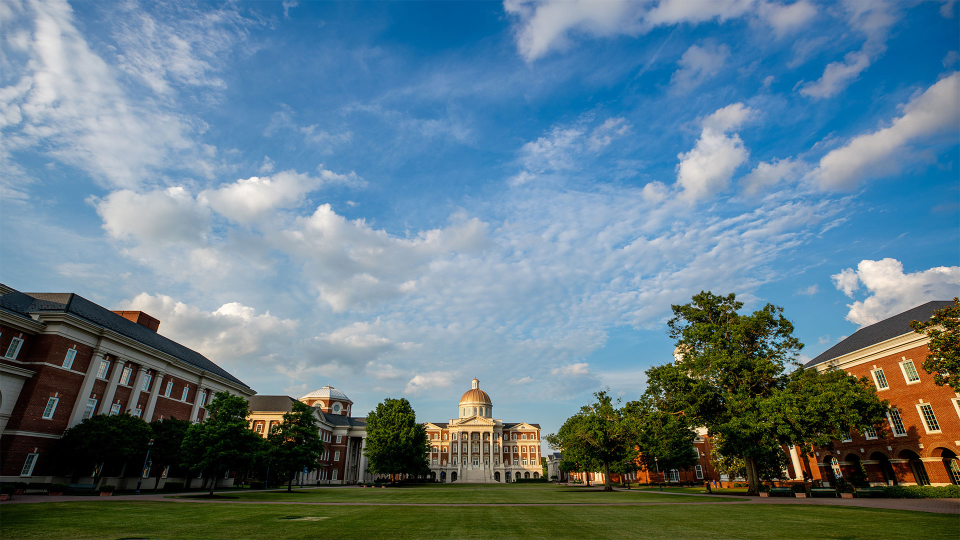 A wide shot view of campus as the sun sets.
