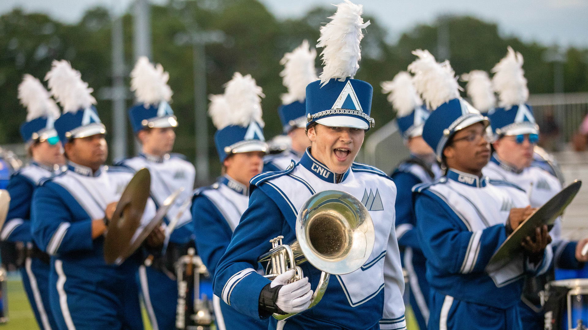 marching band trumpet player smiling