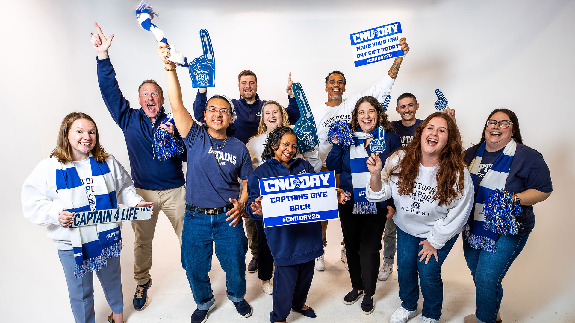 CNU students, alumni and staff wear clothing items from the Vault