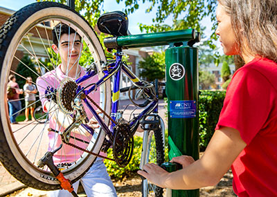 Students fixing a bike