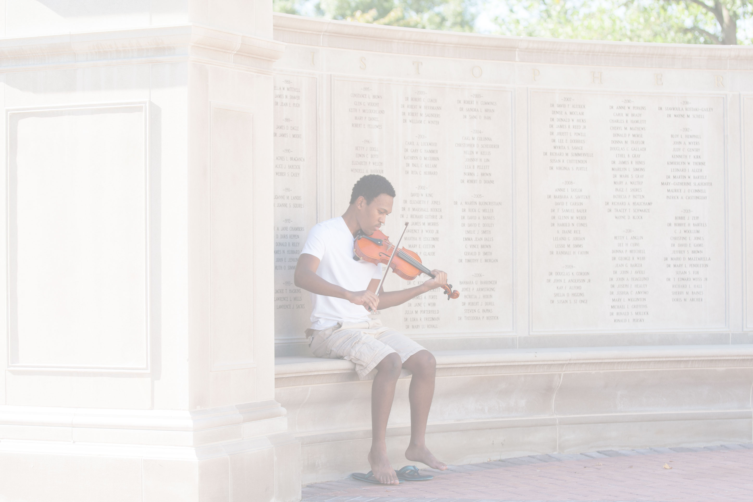 Student playing a violin